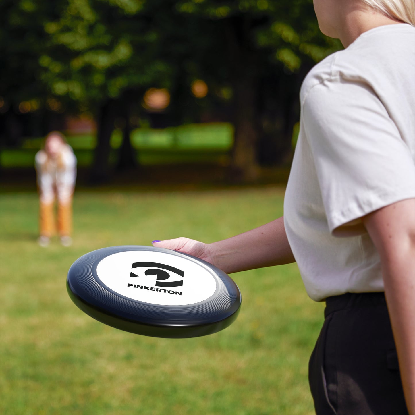 Wham-O Logo Frisbee — Classic Black Flying Disc for Outdoor Play & Parks